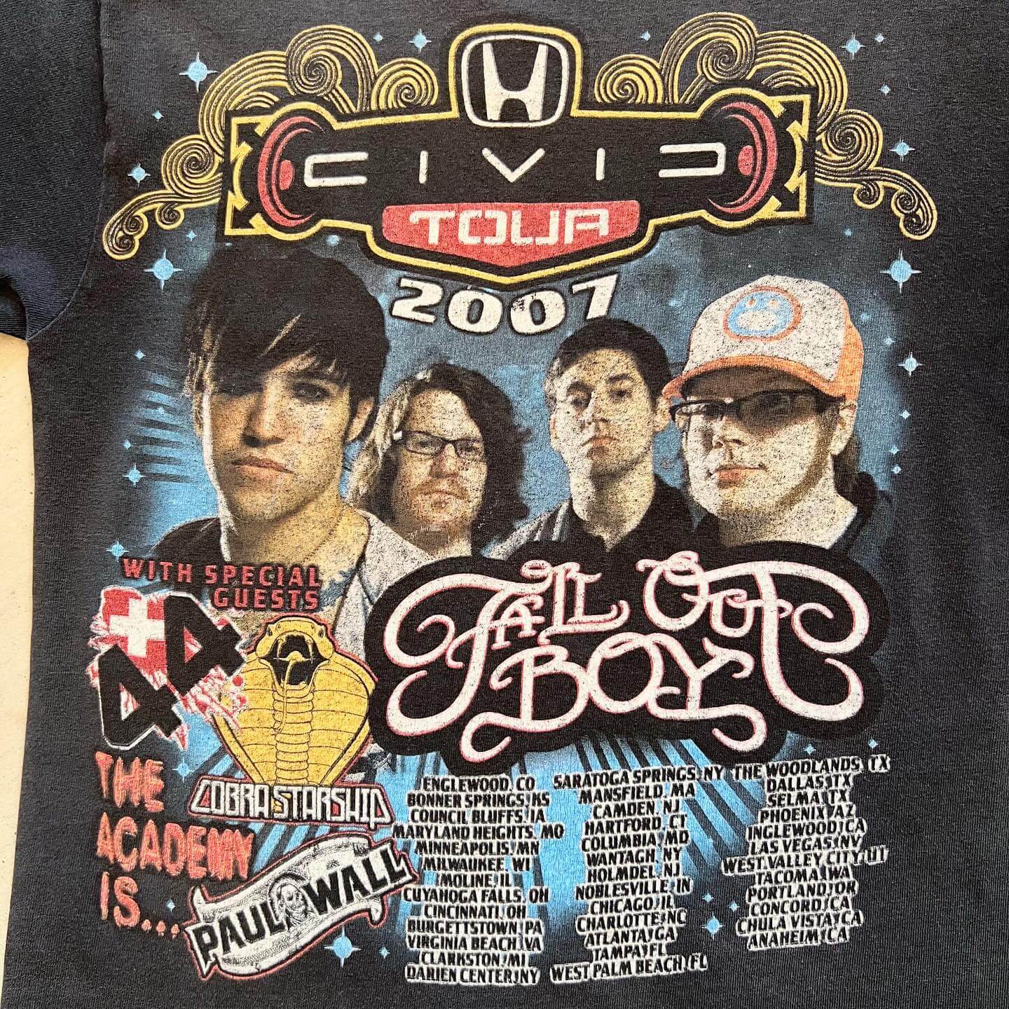 back of a t-shirt with Fall Out Boy and tour schedule