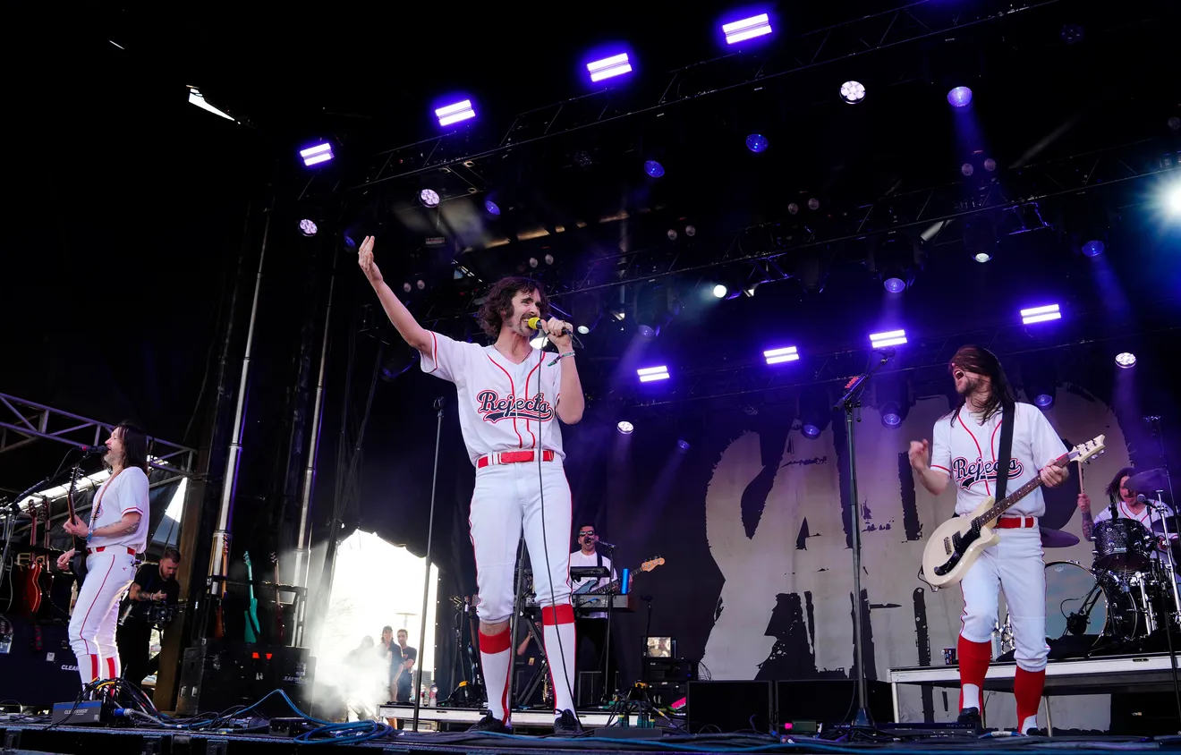 The All-American Rejects performing dressed in baseball uniforms