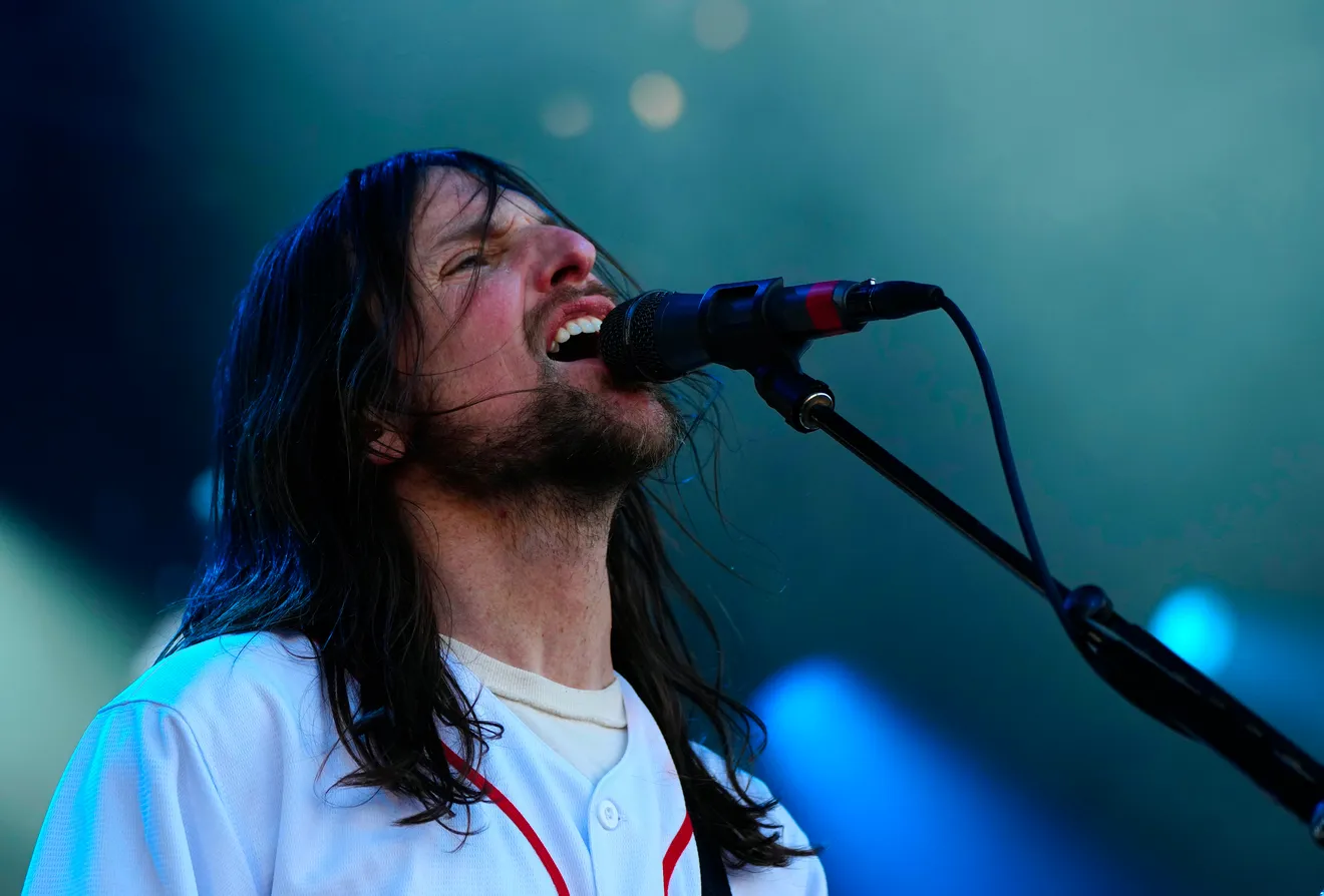 Mike Kennerty singing into the mic