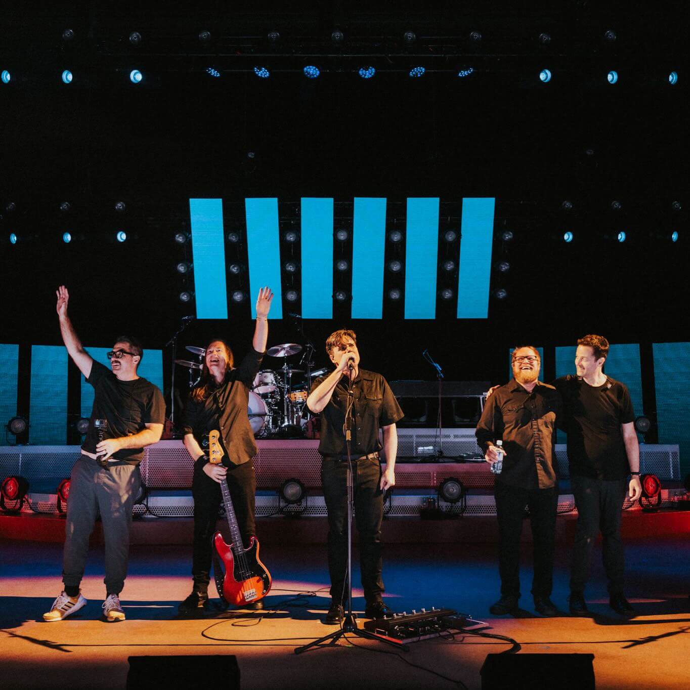 Jimmy Eat World waving and saying goodbye