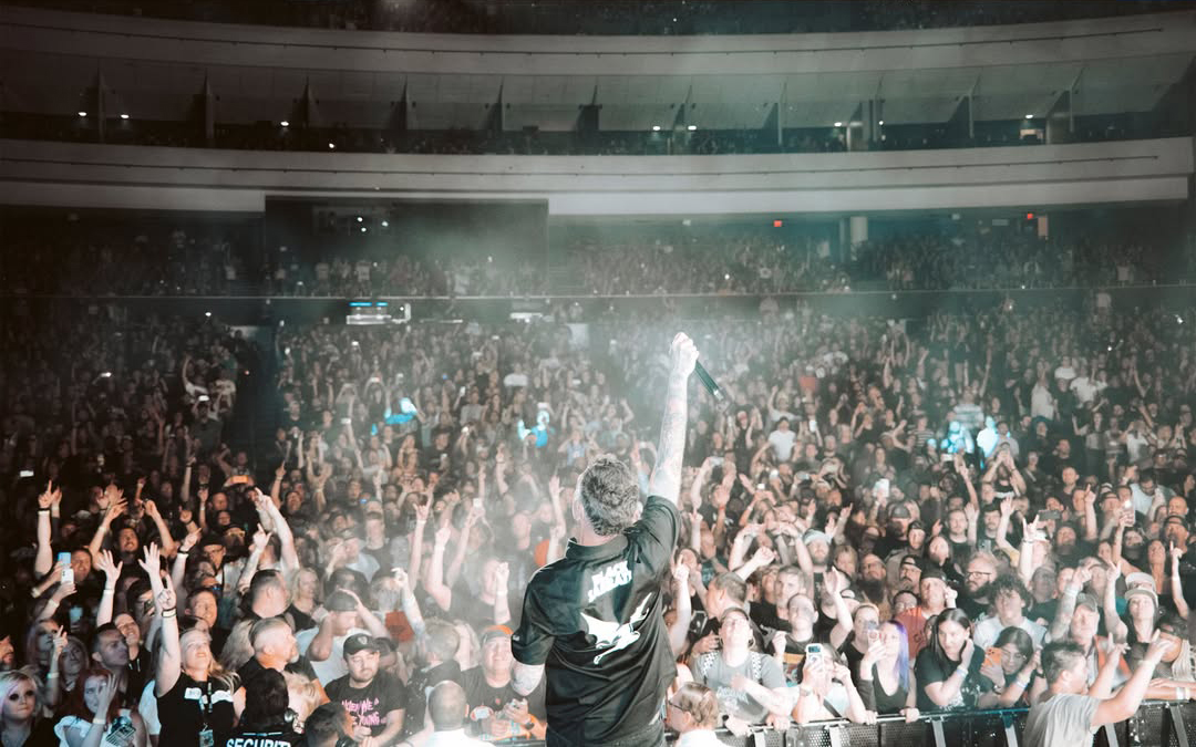 Jordan holding up the mic