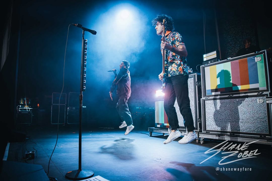 Jordan and Dave Knox jumping at the same time
