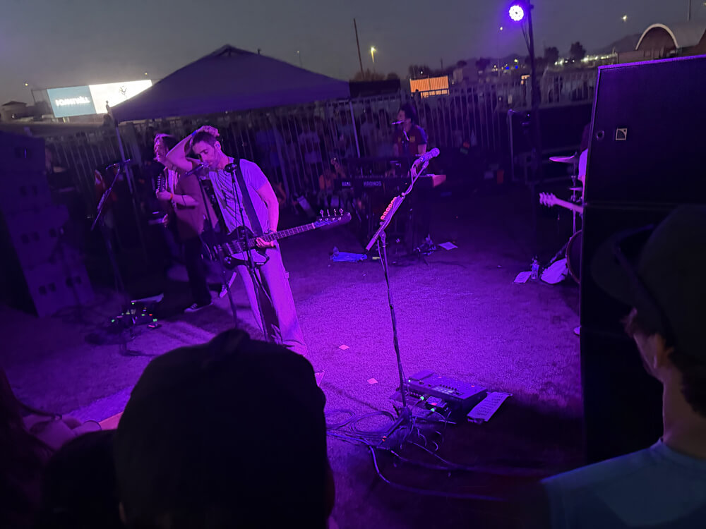 The Rejects bathed in purple light