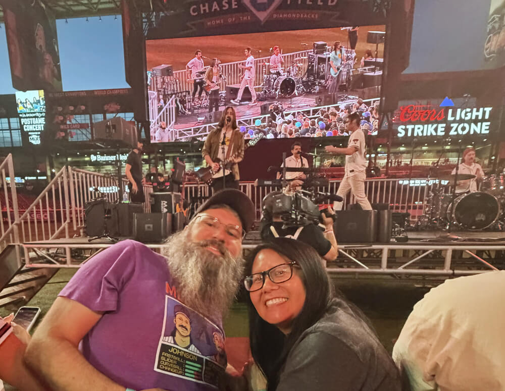 Lynn and Clay so close to the stage, on the barricade with The All-American Rejects behind them