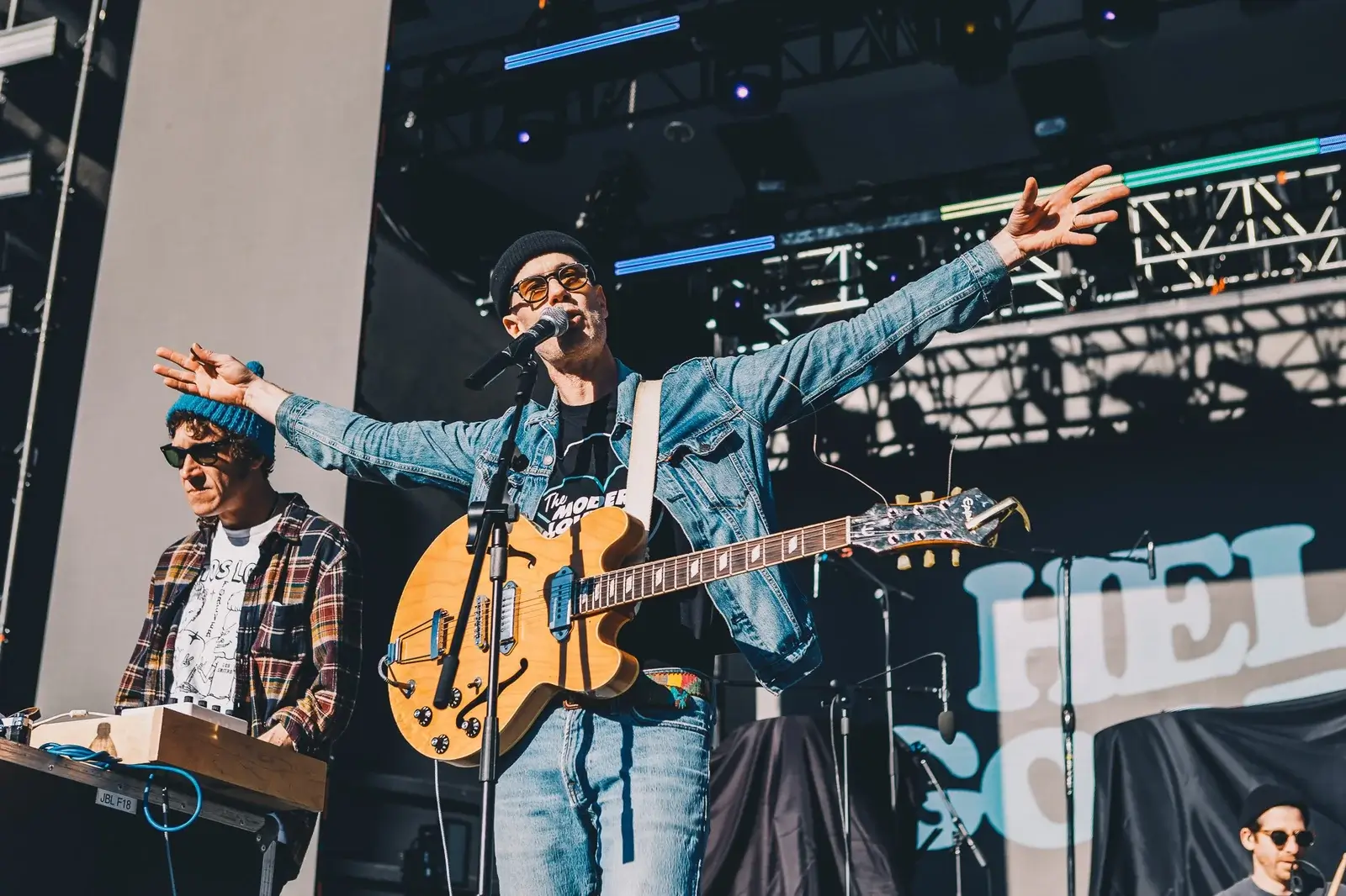 Forrest holding his arms out