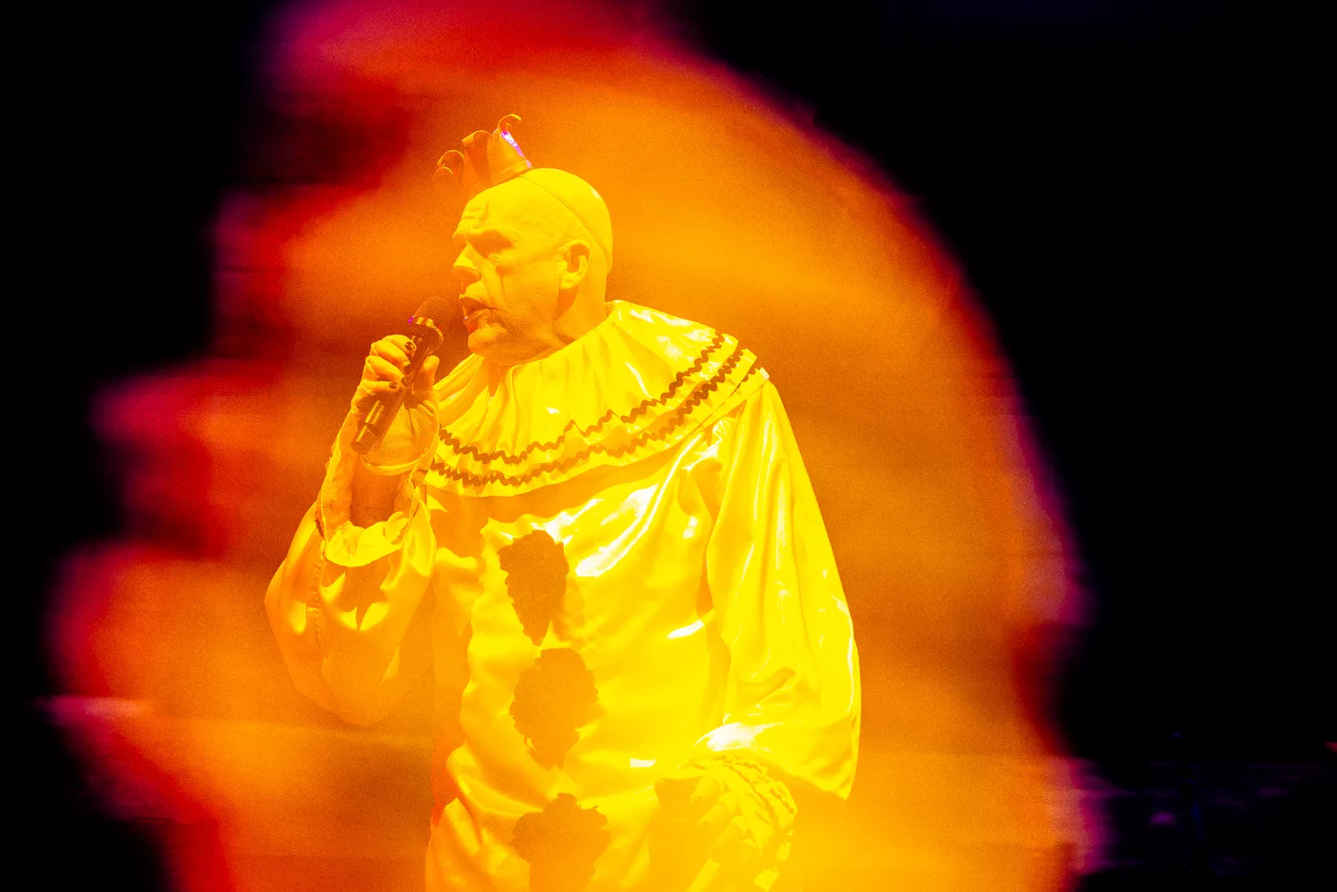 Puddles Pity Party, a large clown wearing a tiny crown